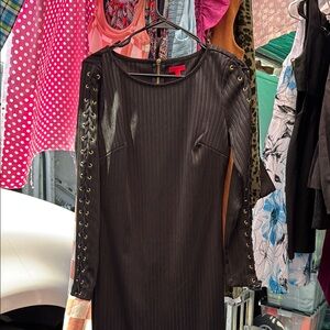 Elegant Black Dress with Lace-Up SleevesJennifer Lopez